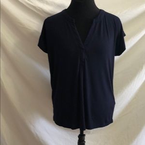 Top with reversed button detail